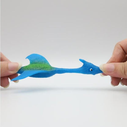 Dinosaur Flinger in 50mm capsule